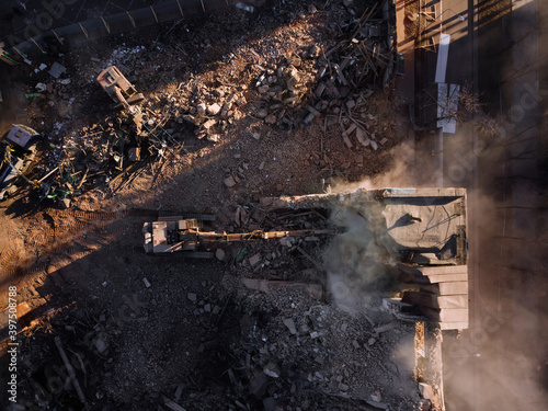 Aerial view of demolition site. Process of demolition of old industrial building