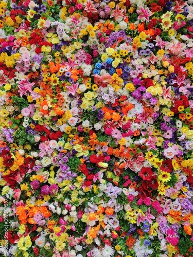 Vertical background of flowers. Colorful panel.