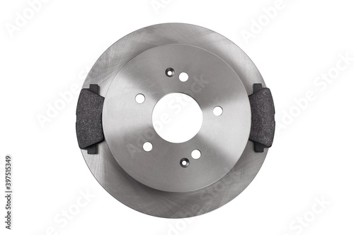 kit of brake pads and brake disc new car spare parts brakes for a vehicle close up isolated on a white background top view, nobody.