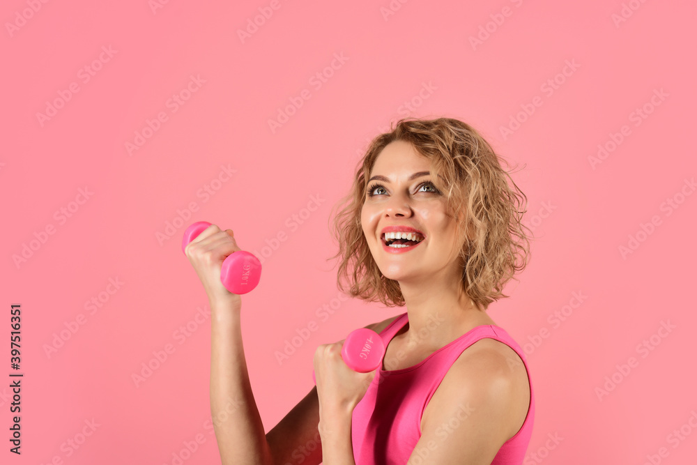 Sport at home. Woman with dumbbells. Sport in self isolation. Cardio workout. Dumbbells. Sporty woman. Healthy lifestyle. Workout at home. Sport at home. Woman with dumbbells. Sport in self isolation. Cardio workout. Dumbbells. Sporty woman. Healthy lifestyle. Workout at home.