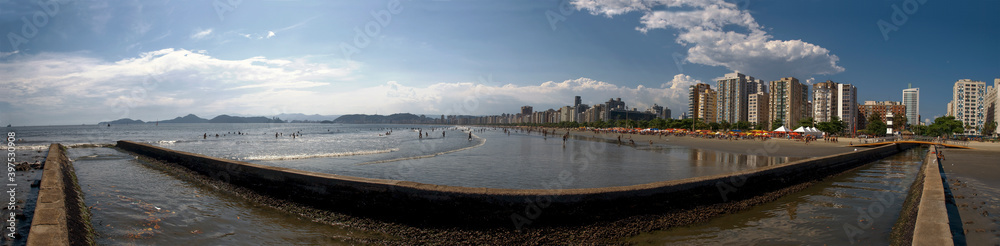 180º panoramic view of the beach and water channel nº6 in the city of Santos on a sunny day.