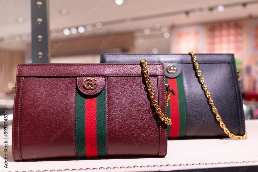 Luxury leather hand bags display on Gucci store shelf in Hamad  International Airport. Gucci is an Italian luxury brand of fashion and  leather goods. DOHA, QATAR - 31 OCT 2019. Stock Photo | Adobe Stock
