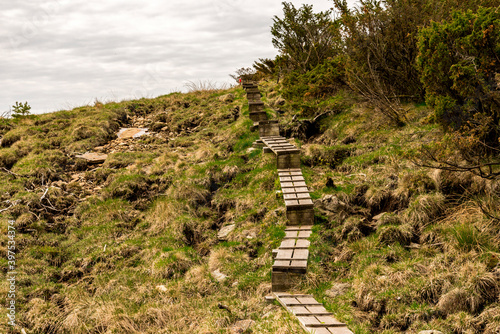 Obraz na płótnie Wooden boardwalk steps on a hiking track to Mastravarden at Mosteroy island, Rennesoy commune, Stavanger, Norway, May 2018 w salonie