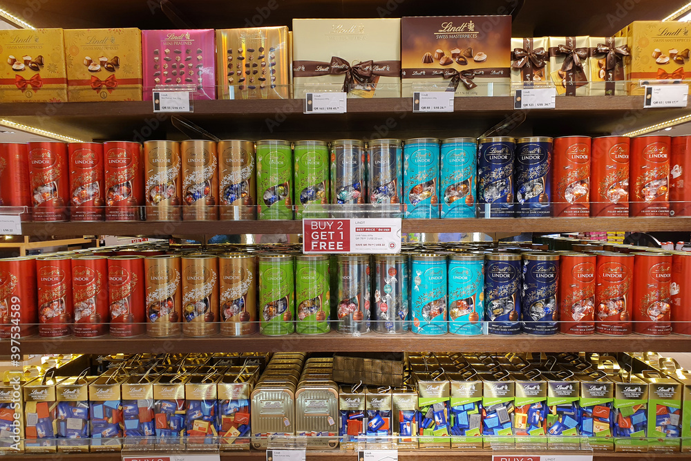 Various Lindt premium chocolate on store shelf in Hamad International