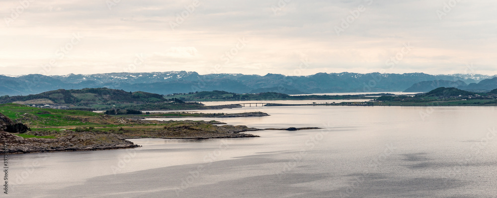 A panoramic view of islands, bridge and mountain range from Fjoloy fortress, Rennesoy commune, Stavanger, Norway, May 2018