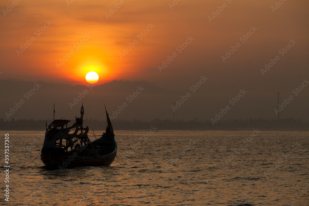Obraz premium Tanjung Papuma Beach is a tourist destination in Jember district. A suitable place to enjoy sunrise and sunset in one area.