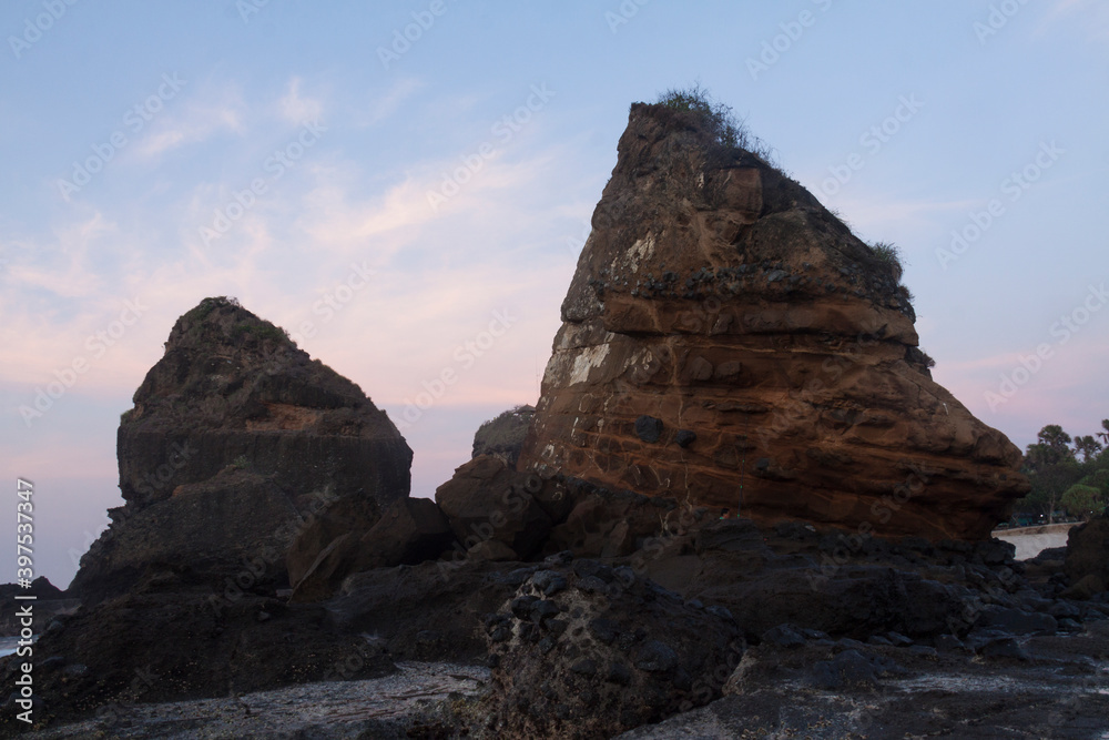 Tanjung Papuma Beach is a tourist destination in Jember district. A suitable place to enjoy sunrise and sunset in one area. Tanjung Papuma Beach is a tourist destination in Jember district. A suitable place to enjoy sunrise and sunset in one area.