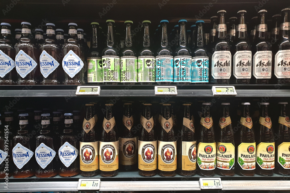 Various brands of local and imported beer display on the shelf in Carrefour  Express store. Carrefour is a French multinational corporation specialized  in retail. FLORENCE, ITALY - 28 OCT 2019. Stock Photo | Adobe Stock