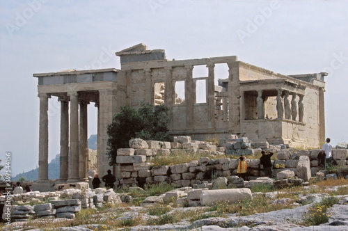 View of the ancient Greek temple Erechtheion with the Caryatid porch at Acropolis in Athens, Greece