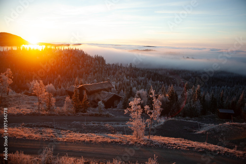  Norwegian sunrise, with beautiful log buildings