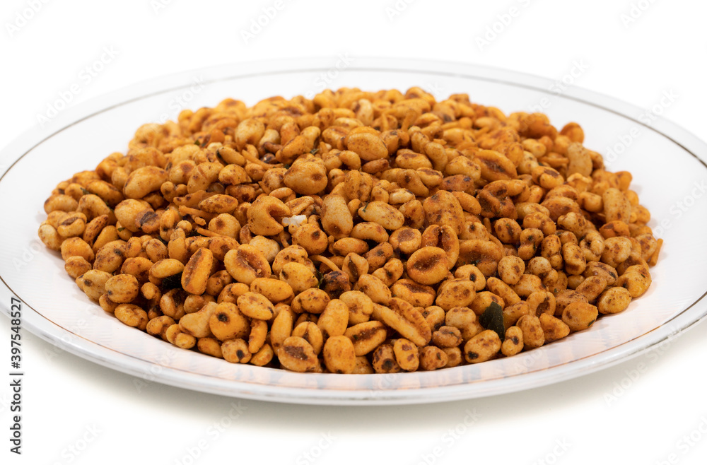 Indian Namkeen Food Puff Masala on White Background Indian Namkeen Food Puff Masala on White Background