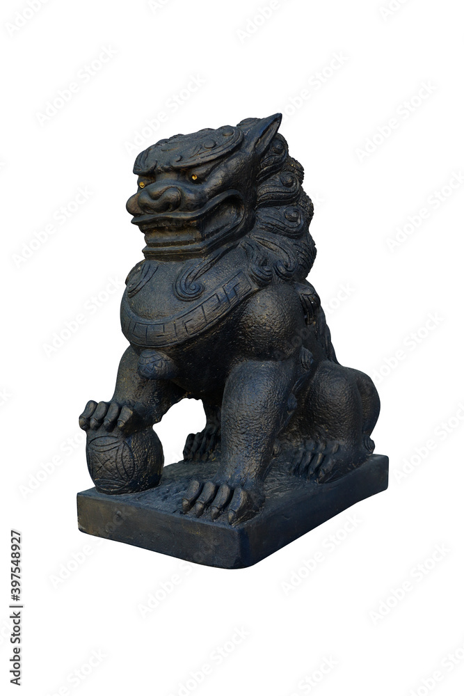 Ancient chinese lion statue stepping on glass ball isolated on white background with clipping path. Ancient chinese lion statue stepping on glass ball isolated on white background with clipping path.