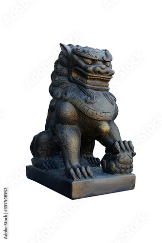 Ancient chinese lion statue stepping on glass ball isolated on white background with clipping path.