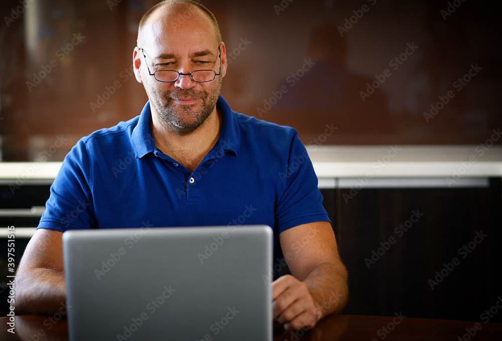men on computer at home men on computer at home