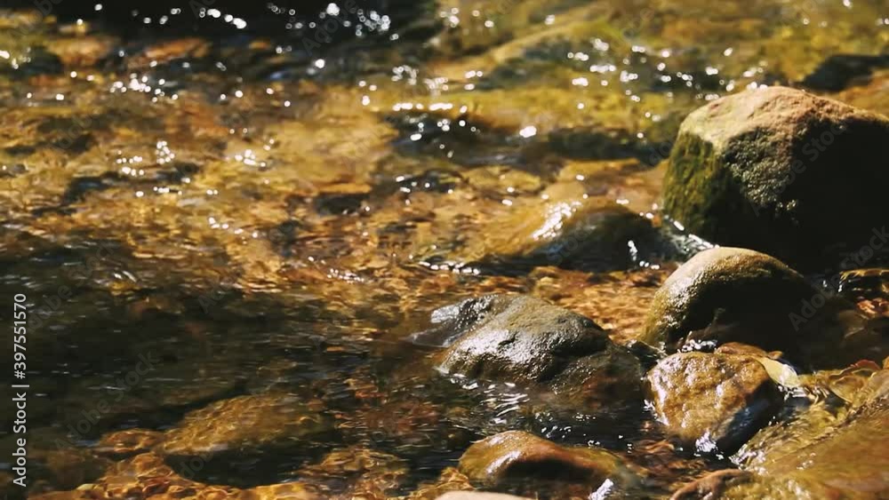 Close up of clean and clear freshwater from a natural spring Close up of clean and clear freshwater from a natural spring