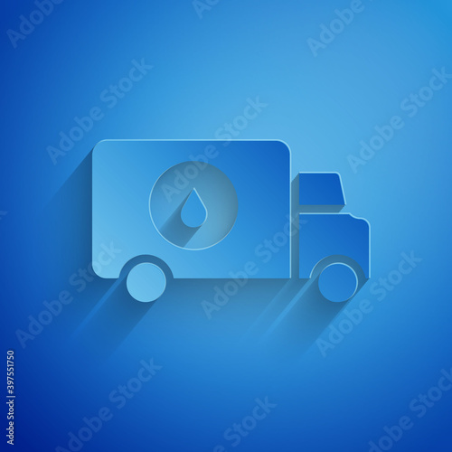Paper cut Plumber service car icon isolated on blue background. Paper art style. Vector.