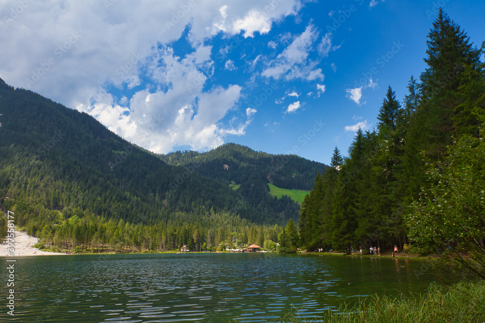 View of Dobbiaco lake in the Dolomites mountains