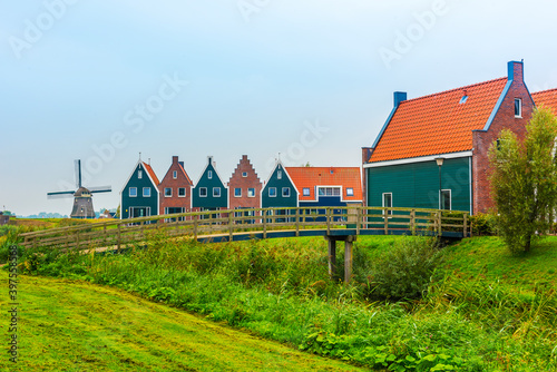 Volendam is a town in North Holland in the Netherlands. Colored houses of marine park in Volendam.