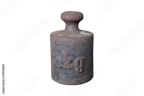 An old mass of two kilograms of iron isolated on a white background with clipping path. Iron weight lab laboratory. Physics laboratory