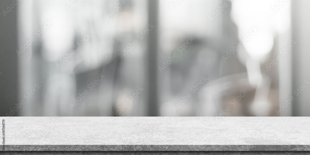 Empty white marble stone table top and blur interior cafe and restaurant. Empty white marble stone table top and blur interior cafe and restaurant.