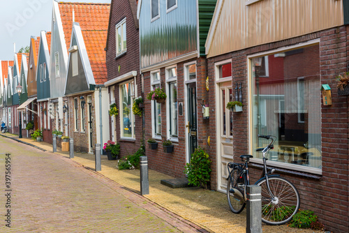 Fototapeta Naklejka Na Ścianę i Meble -  Volendam is a town in North Holland in the Netherlands. Colored houses of marine park in Volendam.