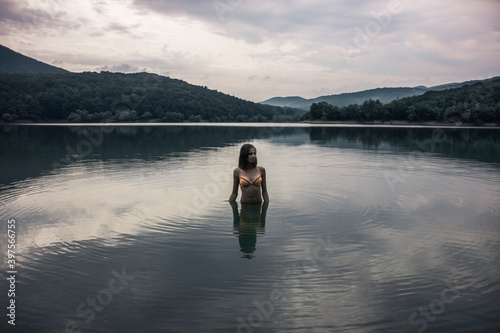 Swimming in the lake. Departure for nature. Young girls