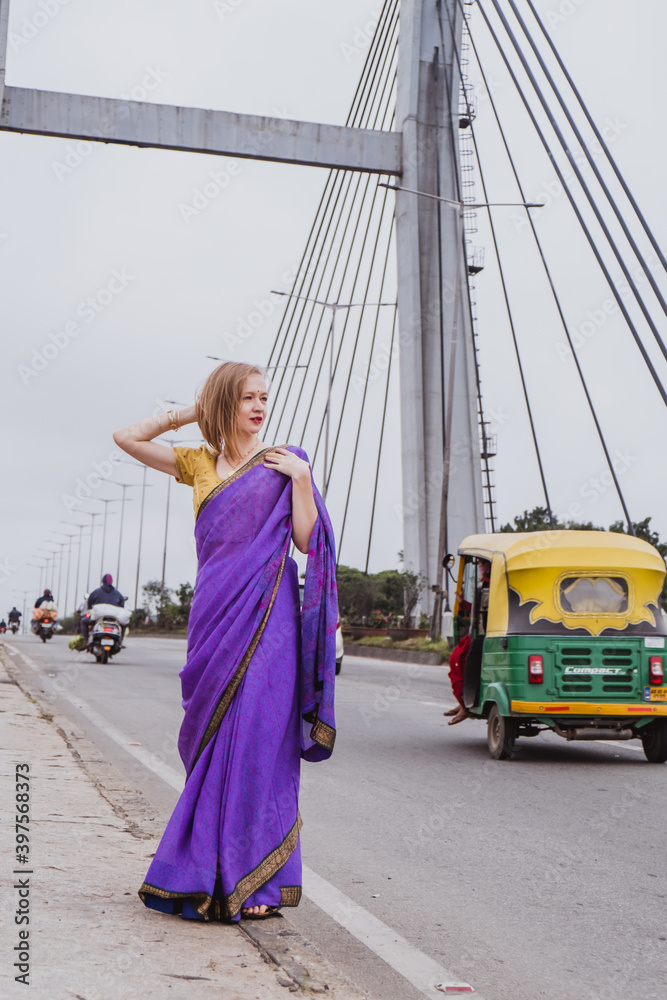 Young european woman with short hair in purple traditional saree. Outdoor  portrait. India, Bangalore Stock Photo | Adobe Stock