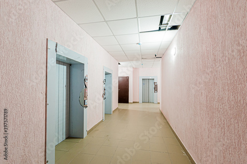 Russia, Moscow- April 17, 2020: interior public place, house entrance. doors, walls, staircase corridors