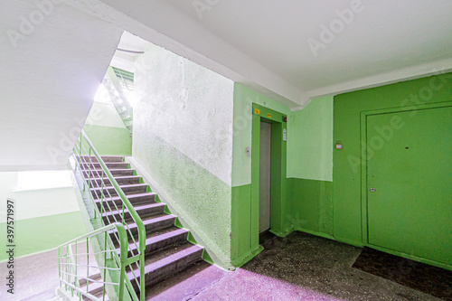 Russia, Moscow- April 17, 2020: interior public place, house entrance. doors, walls, staircase corridors, stairs, steps
