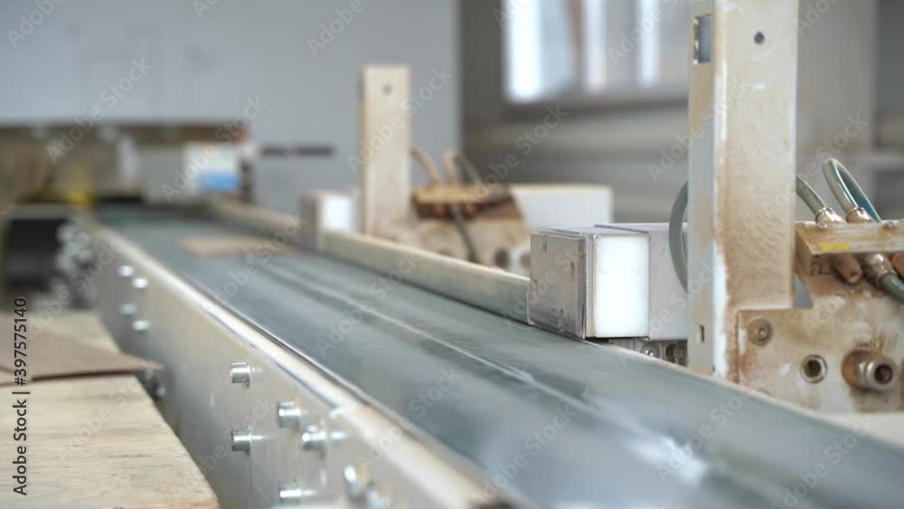 The machine on which small boards go along the tape and he selects them. The machine on which small boards go along the tape and he selects them.