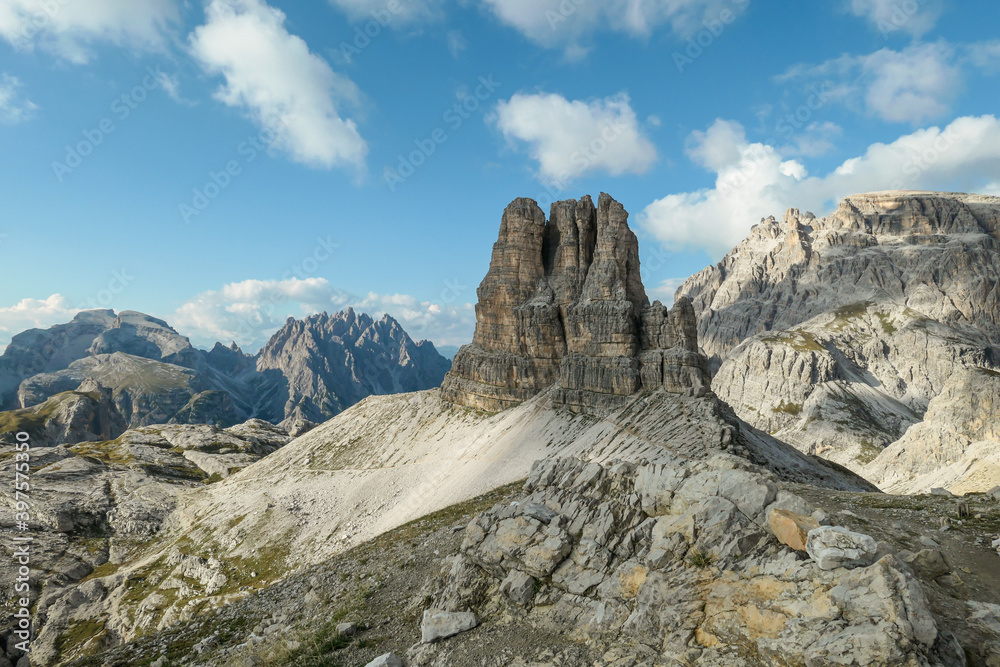 A panoramic view on Toblinger Knoten and surrounding mountains in Italian Dolomites. Difficult ad dangerous climbing route. Stony valley below. Few narrow pathways on the side. Freedom and serenity A panoramic view on Toblinger Knoten and surrounding mountains in Italian Dolomites. Difficult ad dangerous climbing route. Stony valley below. Few narrow pathways on the side. Freedom and serenity