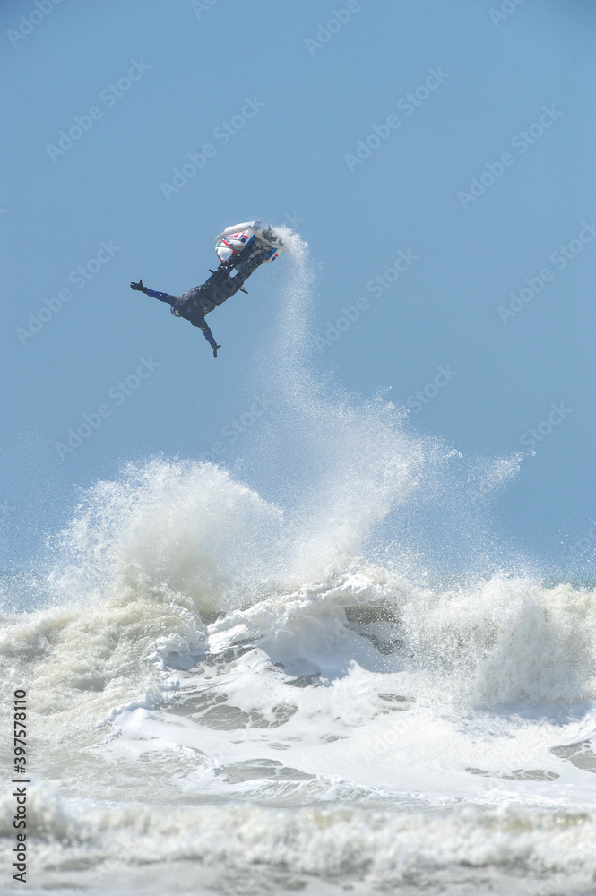 Unusual view of a figure during a jet ski competition