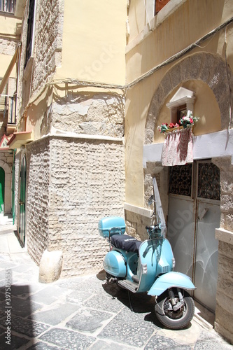 Old street in Bari with blue bike  Apulia  Italy
