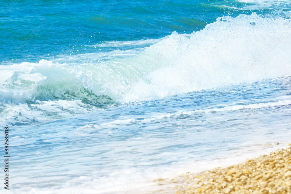 Obraz premium Sea landscape, wave, white foam. Natural waves and beach