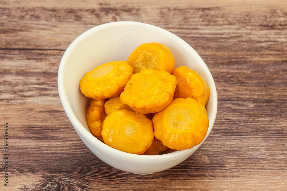 Marinated yellow patisson in the bowl Marinated yellow patisson in the bowl