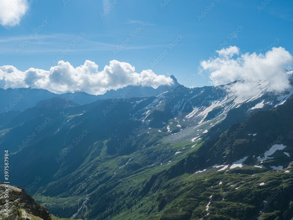 view on snow-capped moutains at Stubai hiking trail, Stubai Hohenweg, Alpine landscape of Tyrol, Stubai Alps, Austria. Summer blue sky