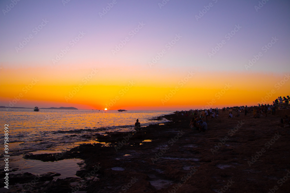 sunset on the beach from ibiza