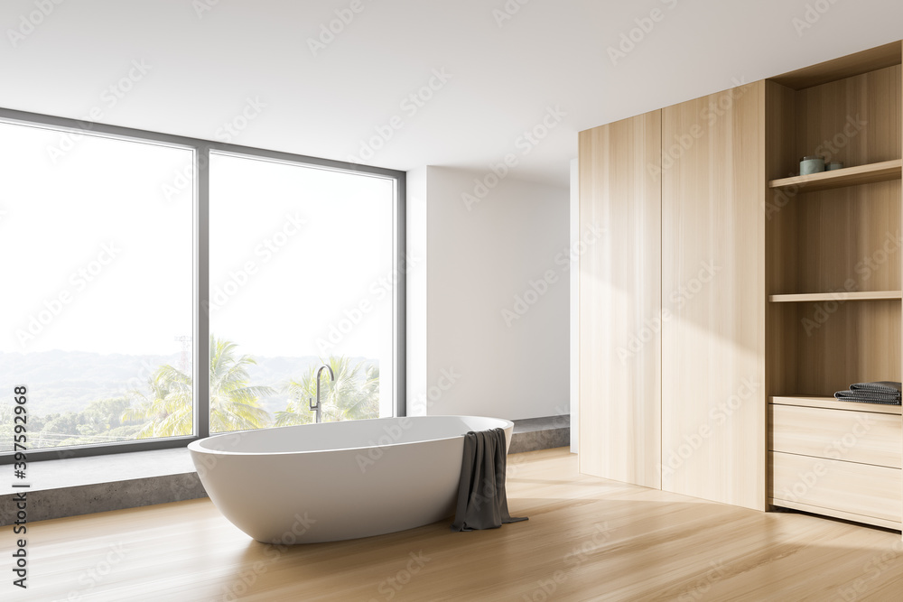 White and wooden bathroom corner with tub and window White and wooden bathroom corner with tub and window