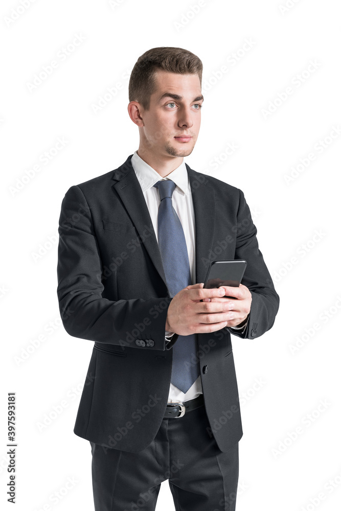 Serious young businessman using smartphone, isolated Serious young businessman using smartphone, isolated