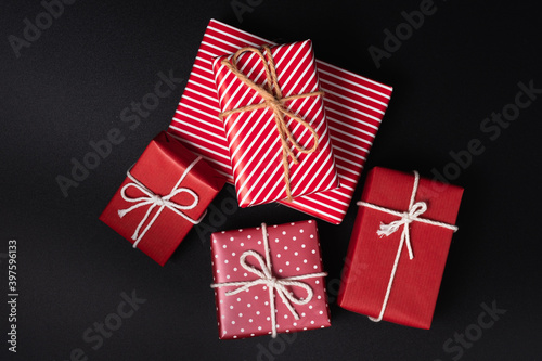 Group of red gift boxes on black background