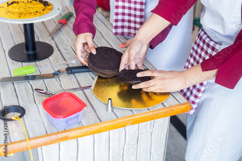 Closeup Of Female Hands Preparing Cake Bread Christmas, Preparation Holiday And Party Season.