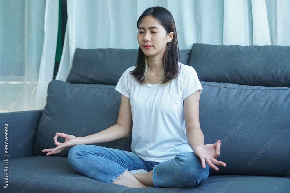 yogi woman practicing yoga lesson, breathing, meditating, indoor close up. Well being, wellness concept yogi woman practicing yoga lesson, breathing, meditating, indoor close up. Well being, wellness concept