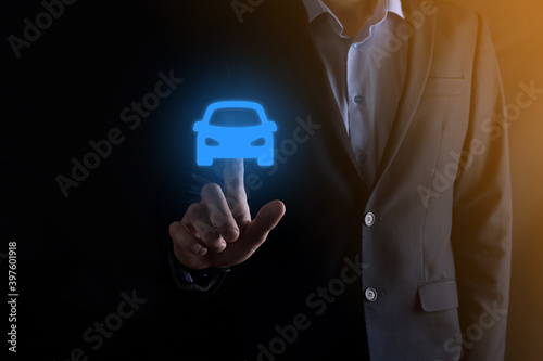 Digital composite of Man holding car icon.Car automobile insurance and car services concept. Businessman with offering gesture and icon of car.