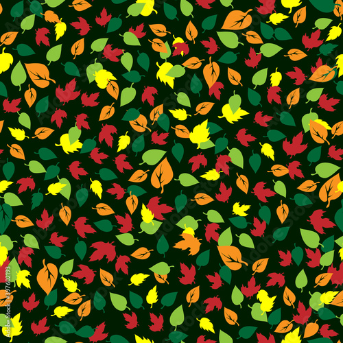 Bright seamless vector floral pattern with many multicolored small leaves on a black background, arranged in a chaotic manner, autumn swirl, for textiles, fabric, wrapping paper, wallpaper.