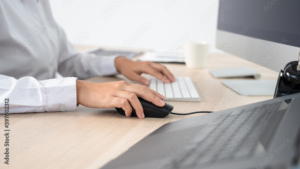 Asian Woman programmer typing source codes Programming On Computer in office, freelance web developer concept. Asian Woman programmer typing source codes Programming On Computer in office, freelance web developer concept.
