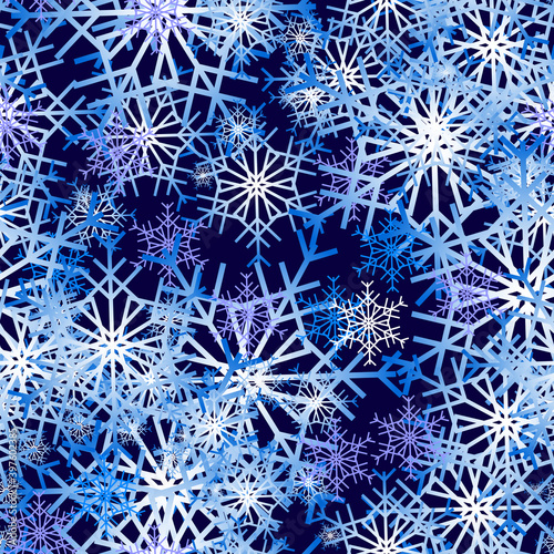 Vector seamless winter New Year pattern with snowflakes on a dark blue background, for design of festive wrapping paper.