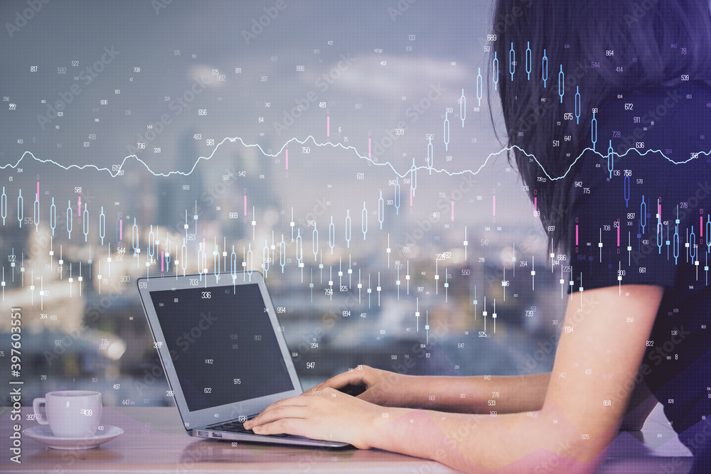 Double exposure of businesswoman hands typing on computer and forex chart hologram drawing. Financial analysis concept. Double exposure of businesswoman hands typing on computer and forex chart hologram drawing. Financial analysis concept.