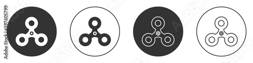 Black Fidget spinner icon isolated on white background. Stress relieving toy. Trendy hand spinner. Circle button. Vector.