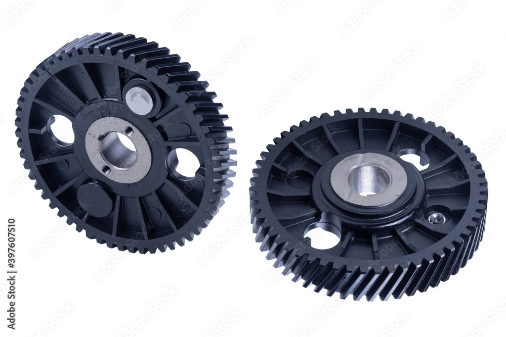 The mechanism for changing the timing of the timing. Round shape exhaust camshaft regulator isolated on white background. Phase regulator. Intake shaft gear. Camshaft timing. The mechanism for changing the timing of the timing. Round shape exhaust camshaft regulator isolated on white background. Phase regulator. Intake shaft gear. Camshaft timing.