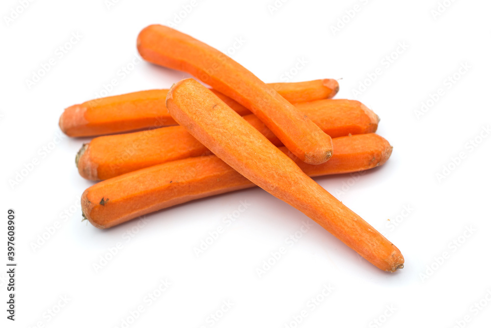 Closeup of peeled carrots on white background Closeup of peeled carrots on white background